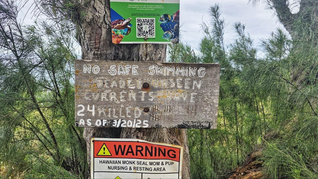 Larsen's Beach Kauai Warning Sign