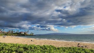 Sunshine And Storm Clouds Over Maui Beach